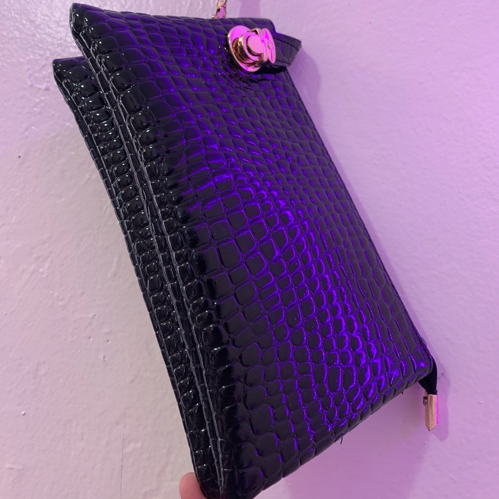 Black leather clutch with strap